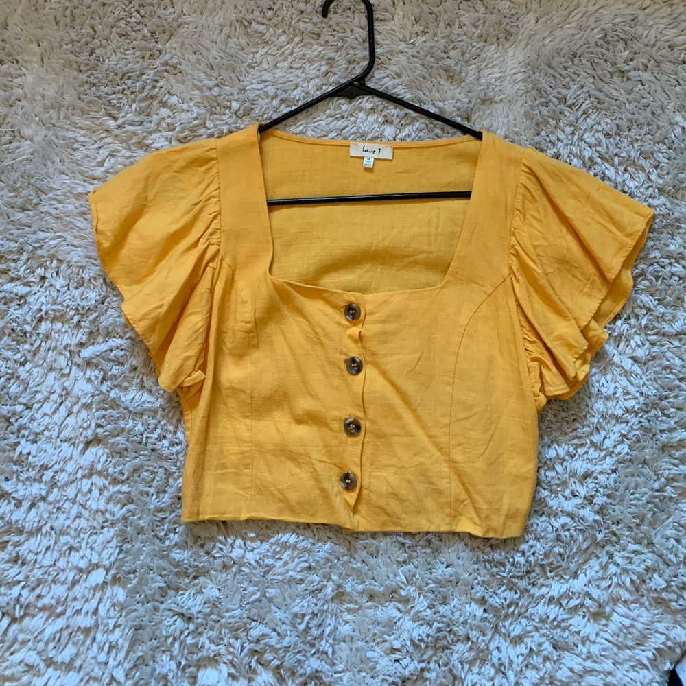 Yellow cropped shirt